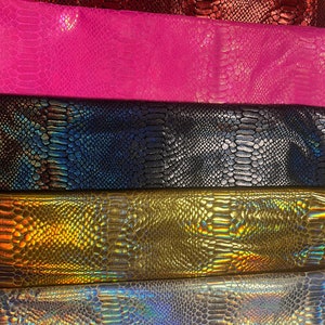 New iridescent foil snake skin design nylon spandex 4-stretch 58/60”sold by the YD.ships worldwide from Los Angeles California USA.