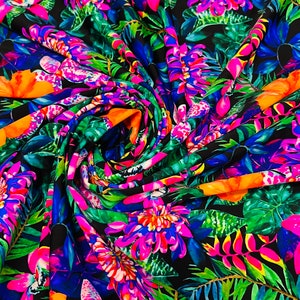 May include: A vibrant fabric with a tropical print featuring pink, orange, and green flowers on a black background.