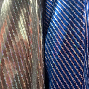 Metallic spandex stripes design w/ hologram foil 4-Stretch 58/60”sold by the YD. ships worldwide from Los Angeles California USA.