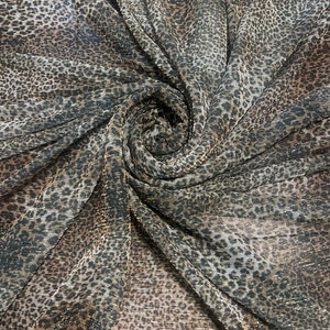 New pleated cheetah design print on metallic mesh 4-way stretch 58/60” Sold by the YD.Ships worldwide from Los Angeles California USA.