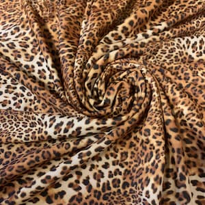 New Leopard design print on the best quality of nylon spandex 4way-stretch 58/60”sold by the YD. Ships Worldwide from Los Angeles C.A USA.