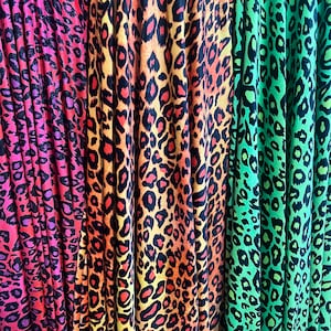 New Leopard pattern design print on stretch velvet 4-way stretch 58/60”sold by the YD. Ships worldwide from Los Angeles California USA.