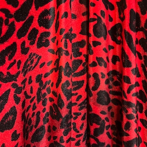 Red/Black Leopard Skin design print on the best quality of stretch velvet 4-way stretch 58/60”sold by the YD.Ships worldwide from LA  USA.
