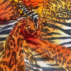New exotic animal design print on power mesh nylon spandex 4-stretch 58/60”Sold by the YD.Ships worldwide from Los Angeles California USA.