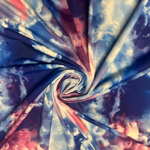 Ambesonne clouds design print on nylon spandex 4-stretch 58/60”sold by the YD. Ships worldwide from Los Angeles California USA