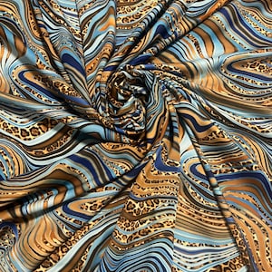 Colorful pattern leopard zebra camouflage design print on nylon spandex 4-stretch 58/60”sold by the YD.ships worldwide from Los Angeles CA.