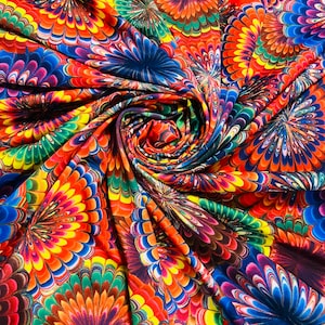 Fashion African design print on the best quality of nylon spandex 4-stretch 58/60”sold by the YD.Ships worldwide from Los  Angeles CA.