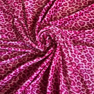 Pretty leopard design print on velvet 420gms 4way stretch 58/60”sold by the YD. Ships worldwide from Los Angeles California USA.