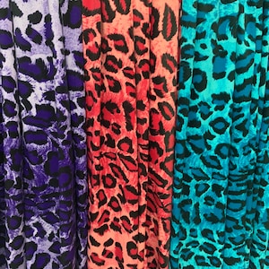 New jaguar design print on the best quality nylon spandex 4-way stretch 58/60”sold by the YD. ships Worldwide from Los  Ángeles California.
