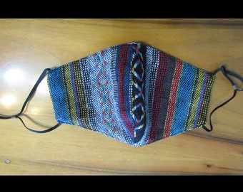 Knitted face mask with native south american decoration.