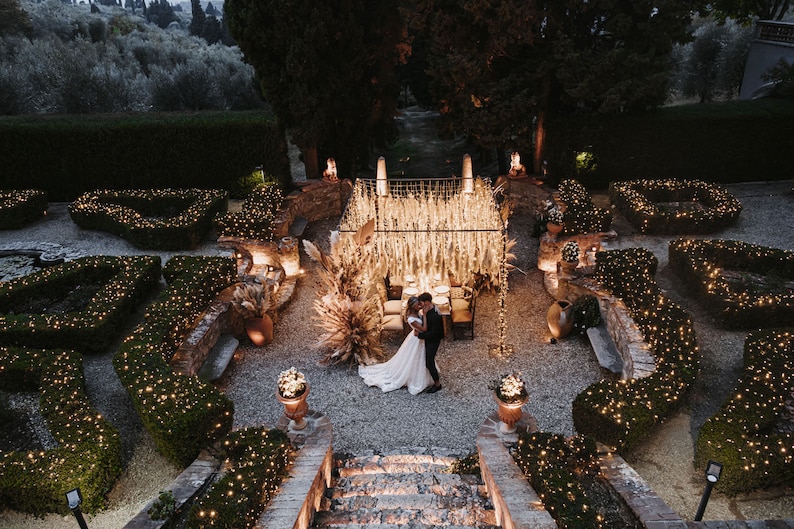3’ lights and pampas grass used in canopy over wedding tables