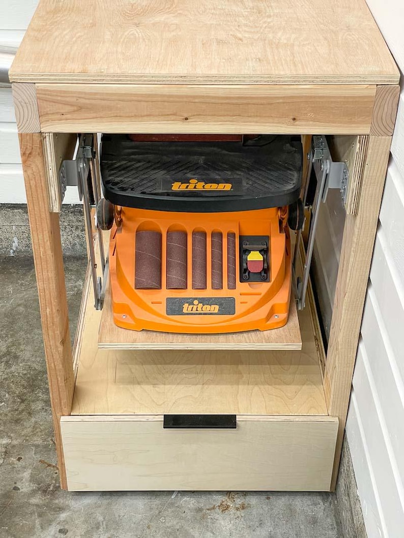 workbench with belt sander in lowered position viewed from the front