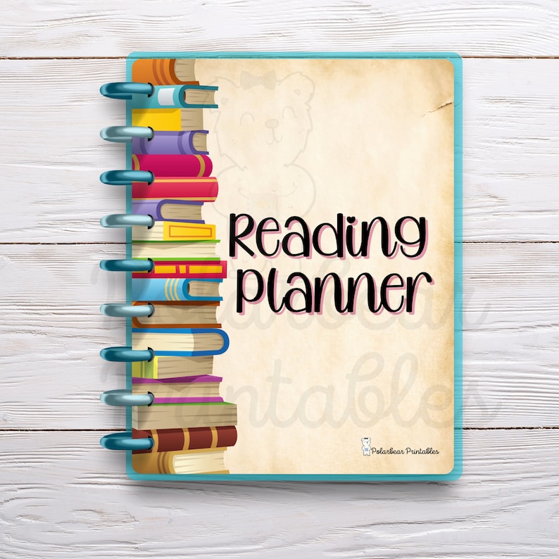 May include: A blue and beige reading planner with a stack of colorful books on the left side and the text "Reading planner" in pink letters. The planner has a spiral binding.