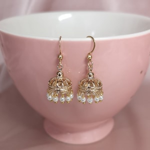 Pearl jhumka shop earrings gold