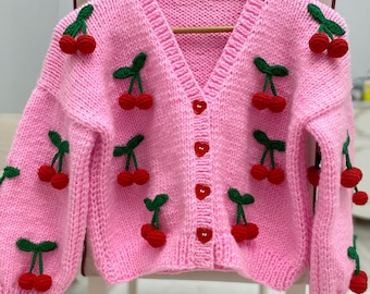 Cárdigan de cereza rosa: suéter oversize de punto grueso