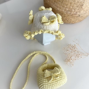 Handgemachte Baby Girl häkeln Sonnenhut und Mini Tasche Set, Butter Gelbe Bögen, Sommer Accessoires für Kleinkinder