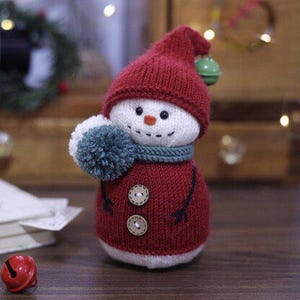 Padrão de tricô de boneco de neve de Natal Padrão de crochê bonito e colorido