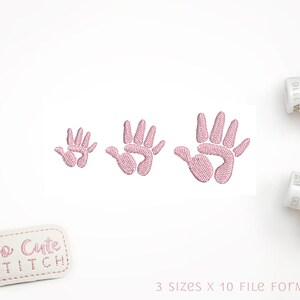 May include: Three pink handprint embroidery designs in different sizes. The designs are perfect for baby clothes, blankets, or other crafts. The text "So Cute Stitch" is on a white label.