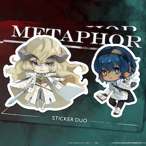 May include: Two sticker designs featuring a white-haired character with horns and a blue-haired character with a blue bird. The stickers are on a white background with the text "METAPHOR" and "STICKER DUO".