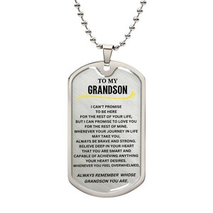 May include: A silver-colored dog tag pendant with a ball chain necklace. The tag has the words "TO MY GRANDSON" at the top, with a heartfelt message below. The text is in a clear, easy-to-read font.
