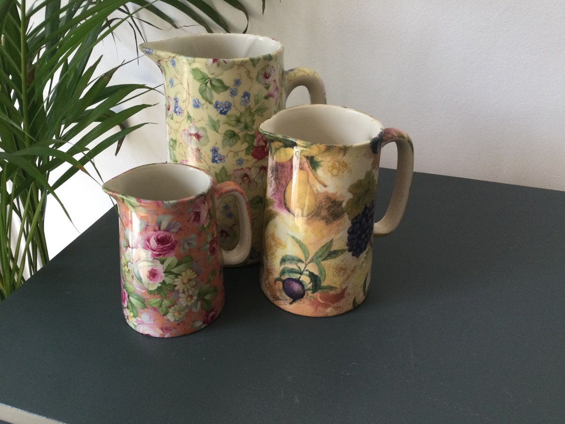 Set of three pretty floral jugs for display or serving. Etsy