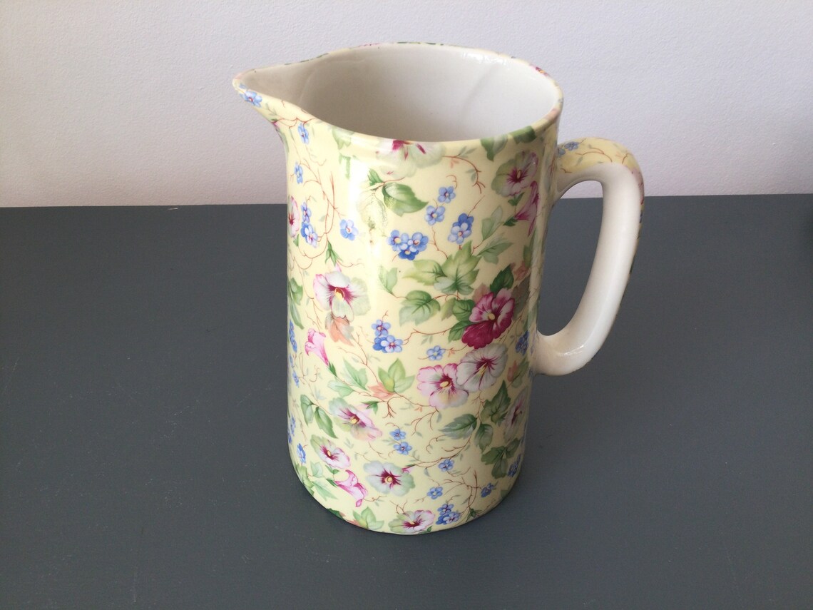 Set of three pretty floral jugs for display or serving. Etsy
