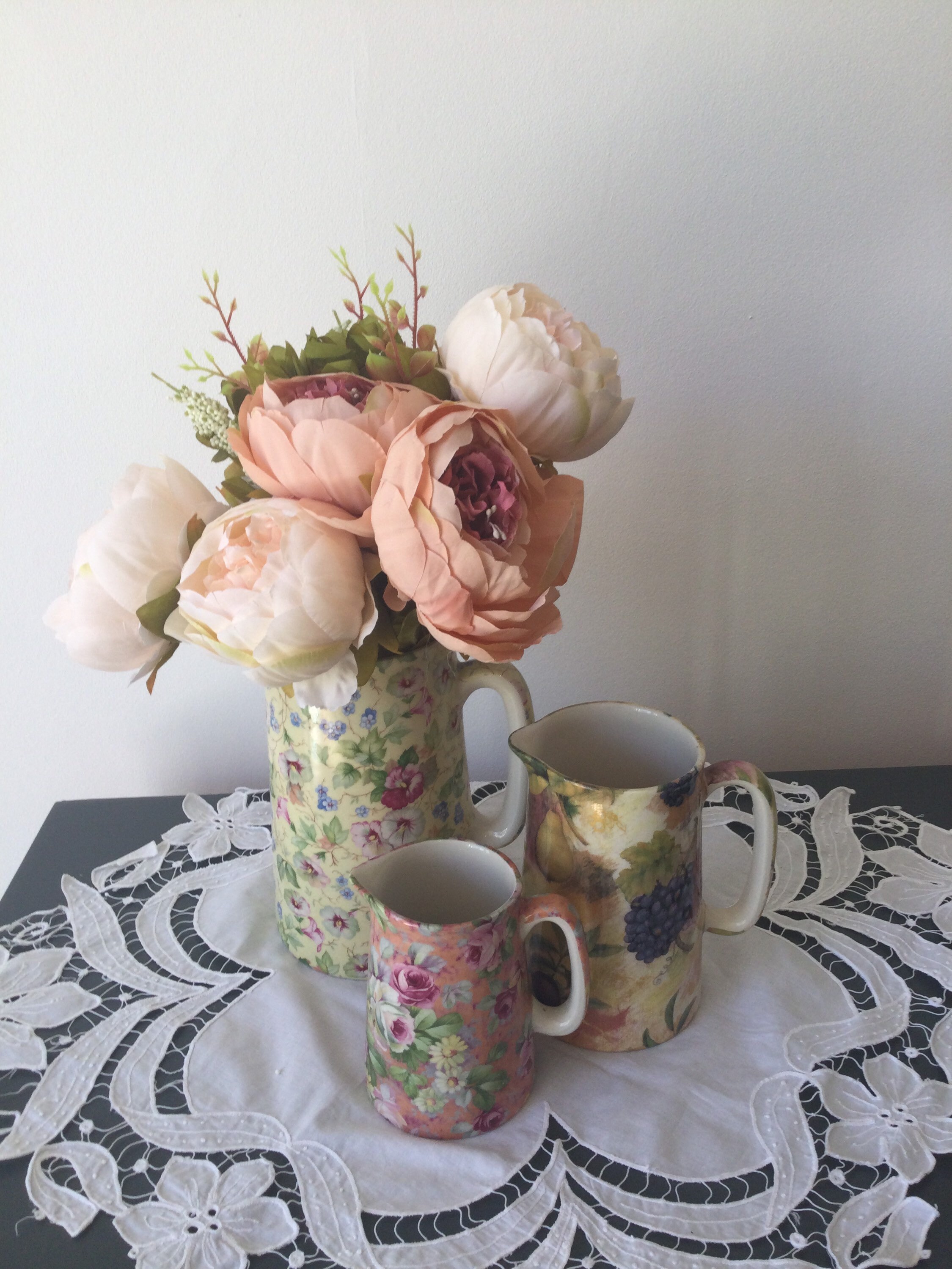 Set of three pretty floral jugs for display or serving. Etsy