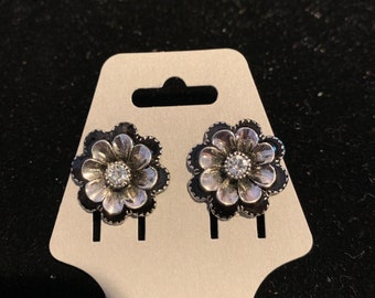 Silver and black floral stud earrings