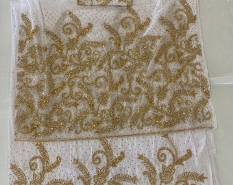 White and Gold George Fabric Material beaded with gold   2.5 Net + 2.5 silk + 2 Net blouse Total 7 Yards. We ship next day