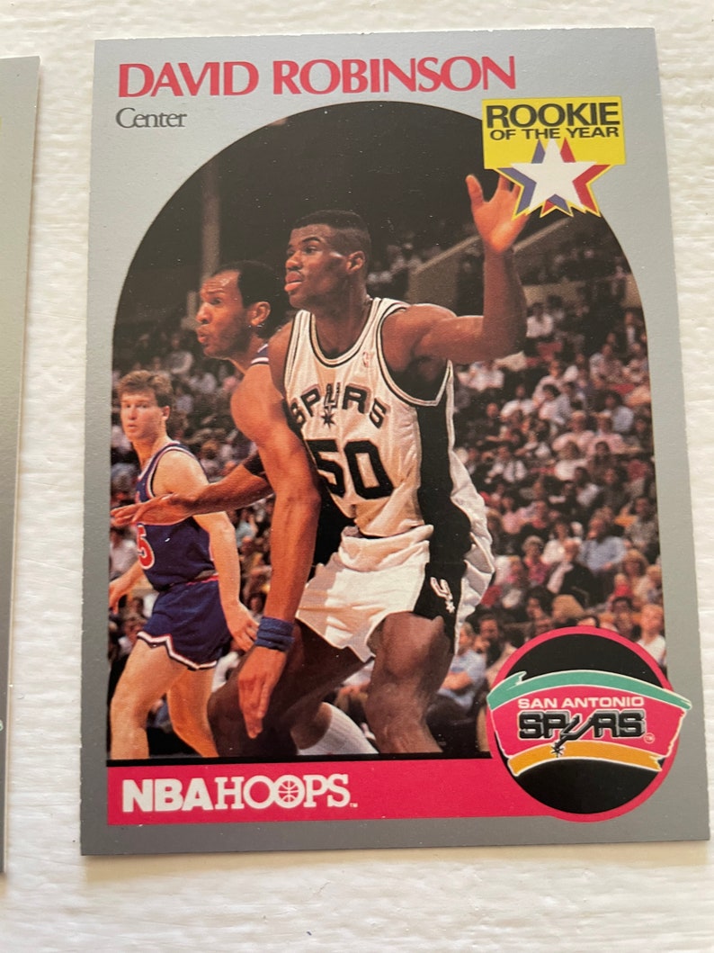 All for 5 cards HOF David Robinson 90-91 NBA Hoops San Antonio Spurs 270 x 3 & HOF David Robinson Skybox 1990-91 260 Rookie x 2 image 1