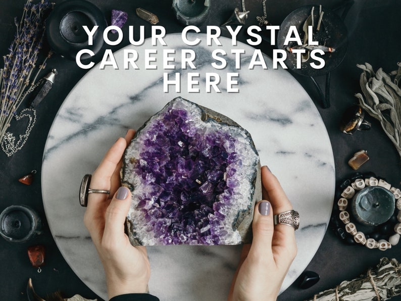 May include: A large amethyst crystal geode with a purple interior, held in hands against a white marble background. The text "YOUR CRYSTAL CAREER STARTS HERE" is displayed above the geode.
