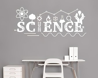 May include: A white wall decal featuring the word SCIENCE in large capital letters. The letters are decorated with scientific icons including an atom, a tree, a DNA strand, a microscope, a beaker, a magnifying glass, and a lightbulb held by hands.