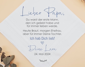 May include: A white square handkerchief featuring blue printed German text that reads: Lieber Papa, Du warst der erste Mann, den ich geliebt habe und für immer lieben werde. Heute Braut, morgen Ehefrau, aber für immer Deine Tochter. Ich hab Dich lieb! Deine Lara 24. Mai 2024.