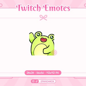 May include: Green cartoon frog with a big smile, waving with its right hand. The frog is wearing a yellow shirt and has a pink flower on its right side. The background is pink with a white frame.