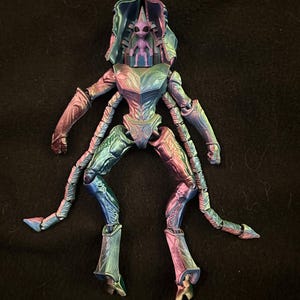 Alien Mech suit with Aquallian driver.
