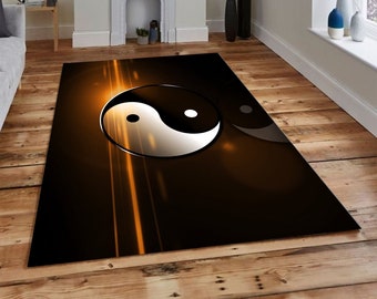 May include: A black and white yin yang symbol on a brown and orange background. The symbol is surrounded by a glowing orange light.