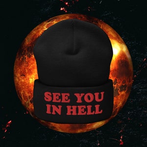 May include: Black beanie with the text "See You In Hell" in red letters.