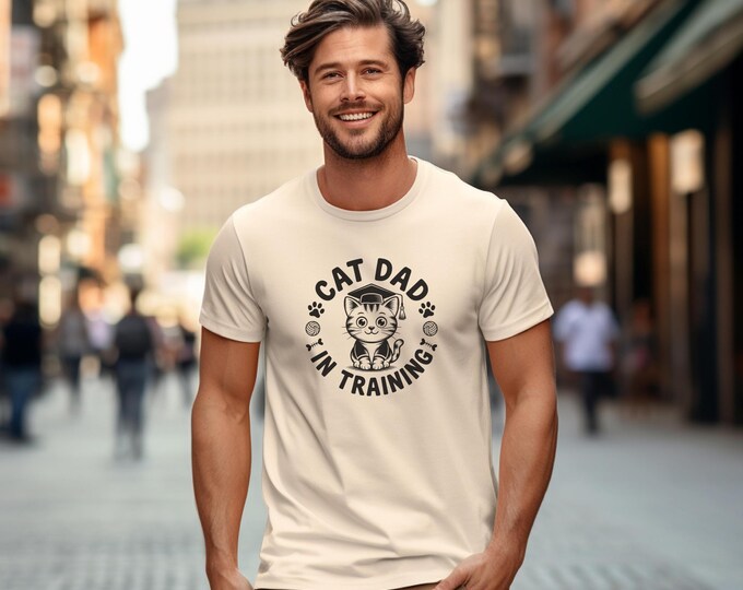 Cat Dad In Training Unisex Softstyle T-Shirt, Funny Pet Lover Tee, Vintage Cat Owner Graphic Top, Gift for Kitty Dad, Cat Daddy Shirt