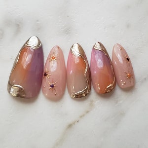 Elegant halloween nails, press on nails, Japanese nails, kawaii nails, orange purple nails, chrome nails