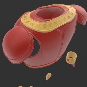 May include: A red and gold decorative object with a circular design. The object has a gold band with Asian characters. A small gold ring with a red accent is also present. The design is likely for a costume or decorative item.