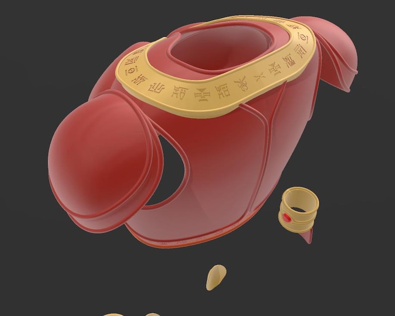 May include: A red and gold decorative object with a circular design. The object has a gold band with Asian characters. A small gold ring with a red accent is also present. The design is likely for a costume or decorative item.