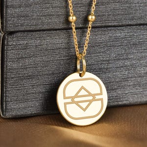 May include: A set of three ceramic mugs with a speckled, matte finish. The mugs are in shades of cream, light gray, and dark gray. Each mug has a simple, minimalist design, perfect for coffee or tea.