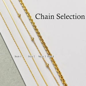 May include: Four different styles of gold chains, labeled "Style 1" through "Style 4". The chains are arranged horizontally, with the top chain being the thickest and the bottom chain being the thinnest. The text "Chain Selection" is at the top of the image.