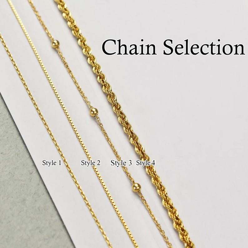 May include: Four different styles of gold chains, labeled "Style 1" through "Style 4". The chains are arranged horizontally, with the top chain being the thickest and the bottom chain being the thinnest. The text "Chain Selection" is at the top of the image.