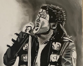 May include: Black and white drawing of a person singing into a microphone. The person is wearing a black jacket with silver embellishments and black pants. The person is holding a microphone stand.