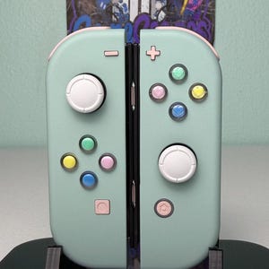 Light Cyan With Colored Hearts - Pink Accents - Custom Joycons for the Nintend Switch