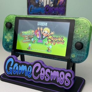 May include: A set of three ceramic mugs with a speckled, matte finish. The mugs are in shades of cream, light gray, and dark gray. Each mug has a simple, minimalist design, perfect for coffee or tea.