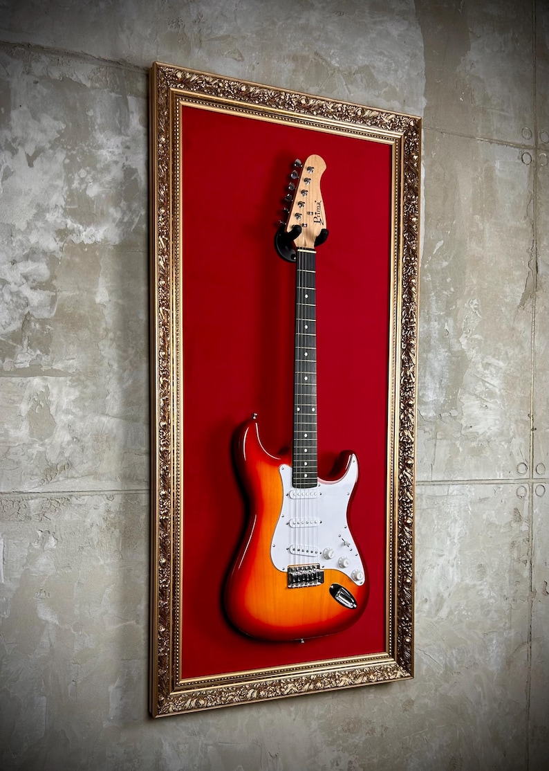 Gitaarstatief of gitaar muurbeugel kopen