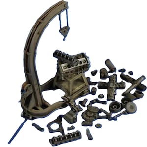 May include: A collection of miniature metal model parts, including an engine, crane, and various components. The parts are in a metallic gray color, suggesting a vintage or industrial theme. The crane has a curved arm and a hook.