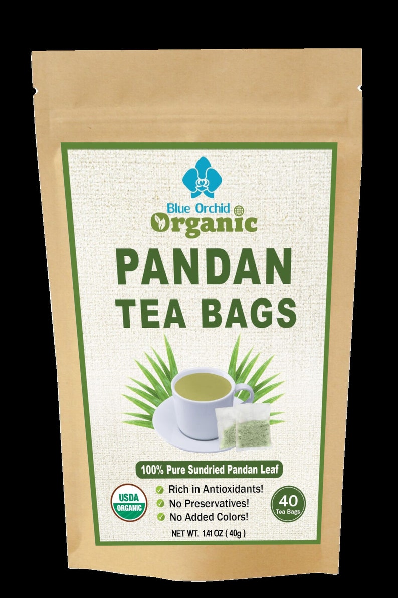 Puede incluir: Una bolsa de papel marr&oacute;n de bolsas de t&eacute; de pandan org&aacute;nico Blue Orchid. La bolsa presenta una etiqueta verde y blanca con el texto "Pandan Tea Bags" y una ilustraci&oacute;n de una taza de t&eacute;. La bolsa contiene 40 bolsitas de t&eacute;, peso neto 40g.
